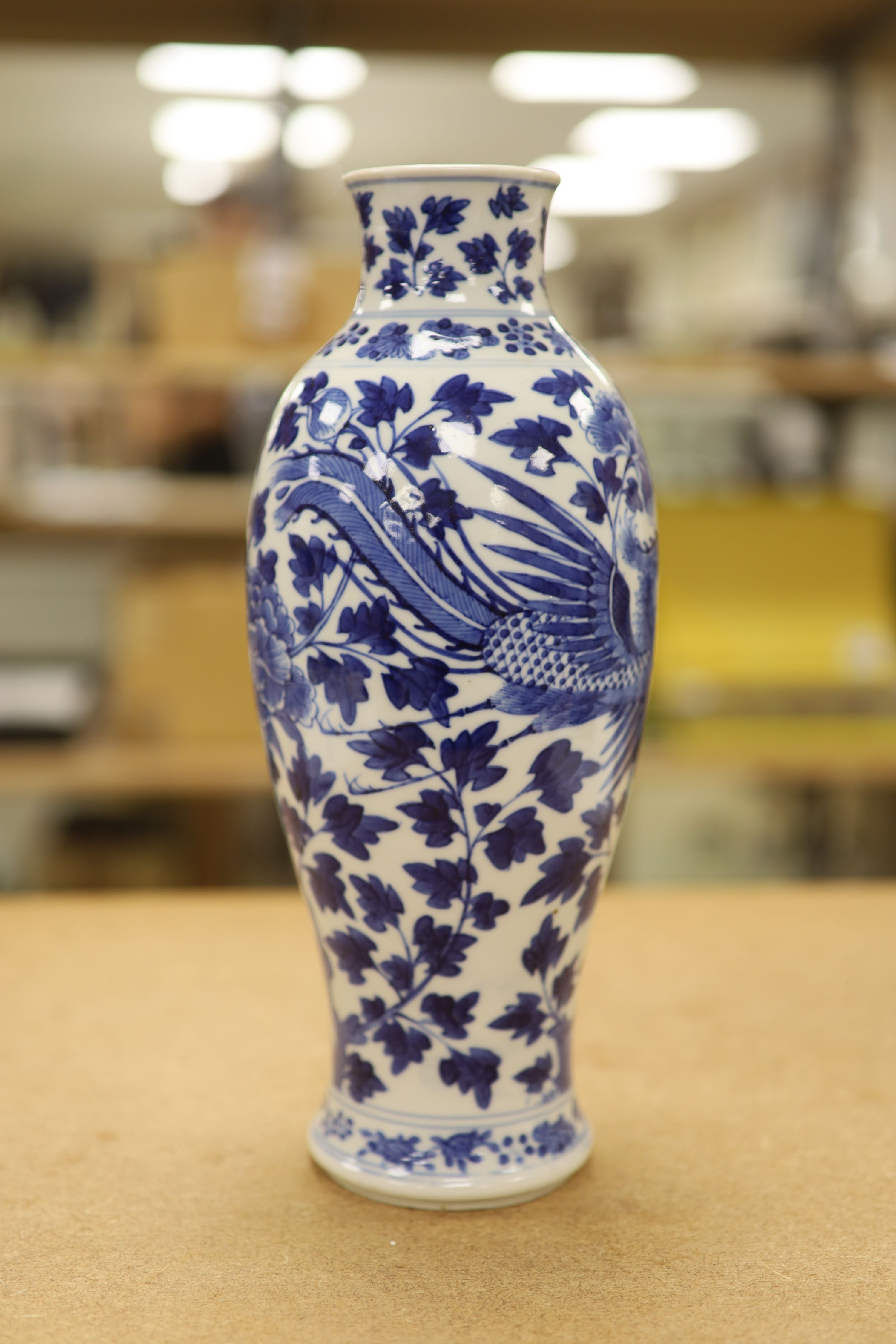 Two 19th century Chinese blue and white vases, decorated with phoenix, tallest 28cm (a.f)